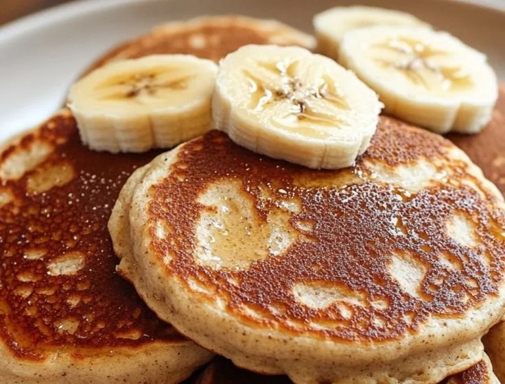 Delicious 3 ingredient banana oatmeal pancakes served on a plate