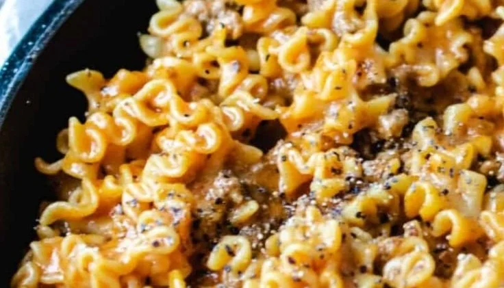 Easy homemade Hamburger Helper lasagna dish served on a wooden table