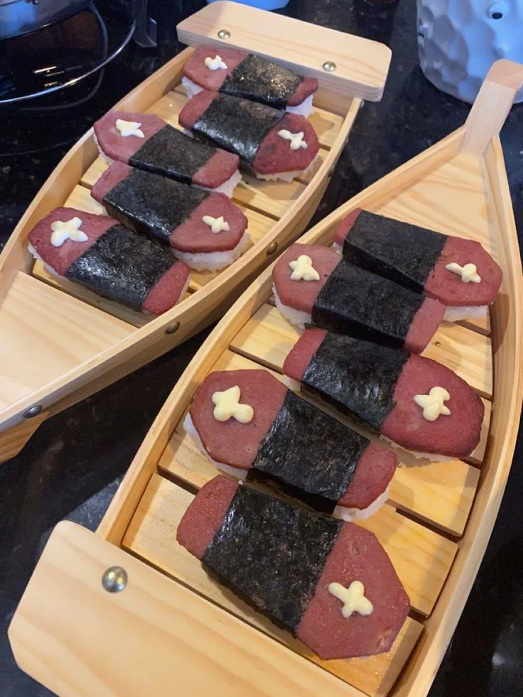 Halloween-themed spam musubi shaped like a coffin, perfect for spooky celebrations.