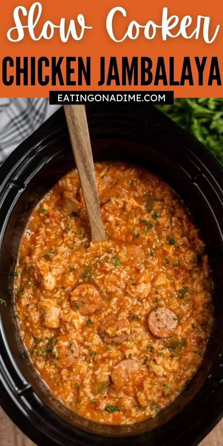 Delicious slow cooker chicken jambalaya served in a bowl with fresh herbs.