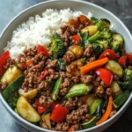 spicy ground beef stir fry bowl with garlic veggie 2026 07 22 213025 1