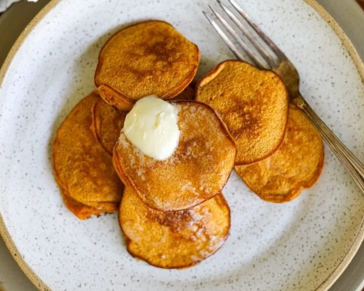 Gluten-free and dairy-free sweet potato pancakes served on a plate