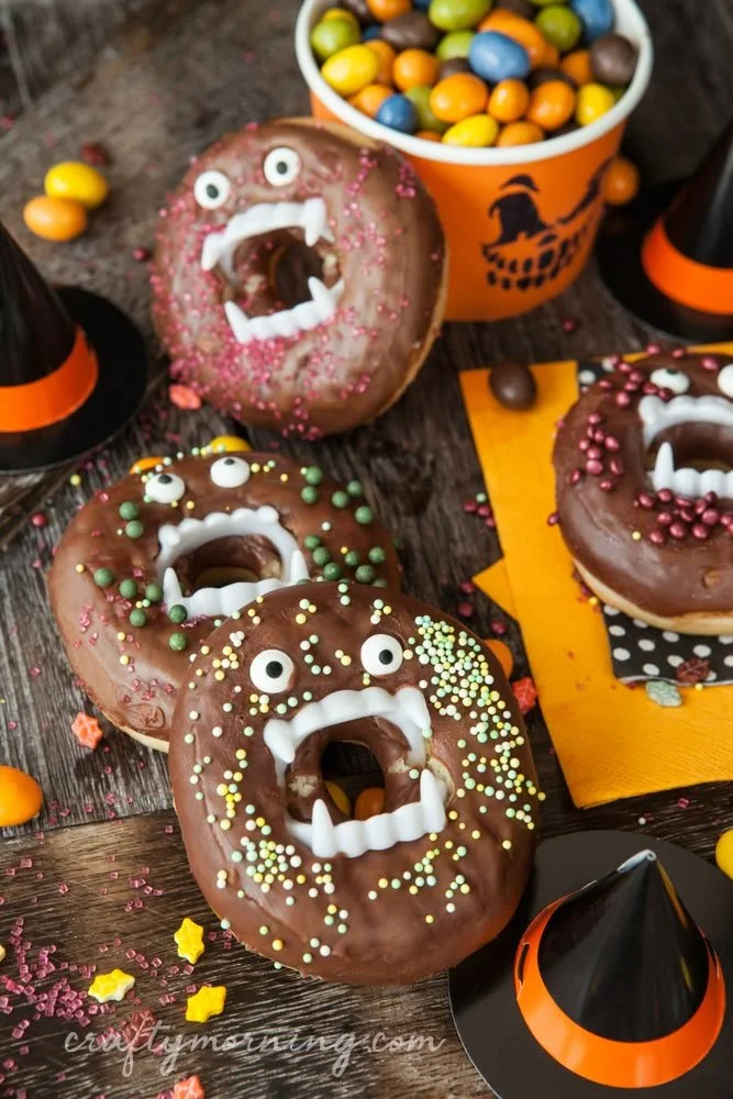 Vampire Halloween Donuts decorated with spooky icing and candy details.